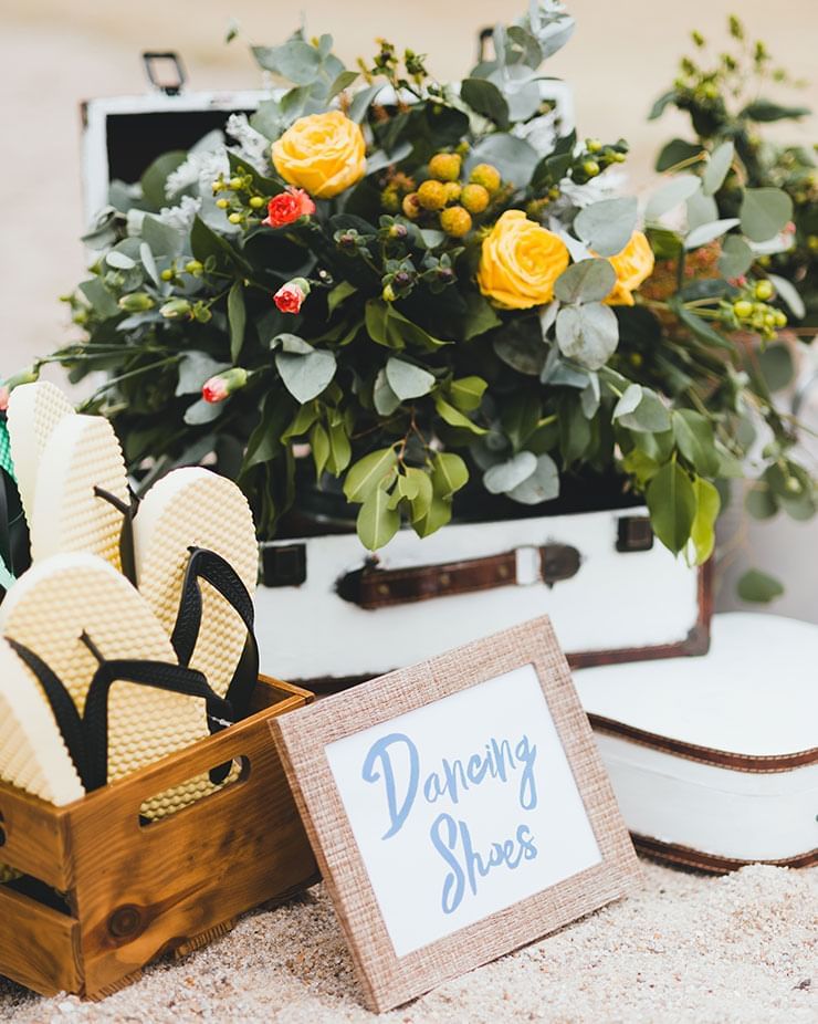 Allow your guests to have dancing slippers to enjoy your beach wedding