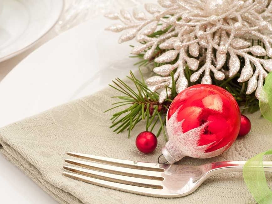 Dining setting with a fork & Christmas ornament at Rosen Inn Lake Buena Vista