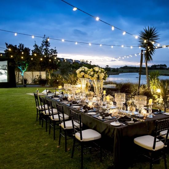 Dining table arranged for night function at Pullman Magenta Shores