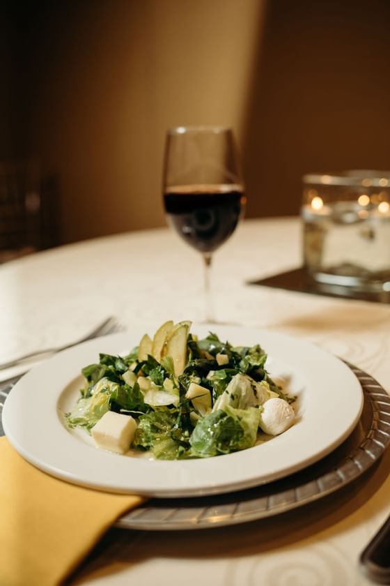 Caesar salad & wine served at Araiza Hotel Hermosillo