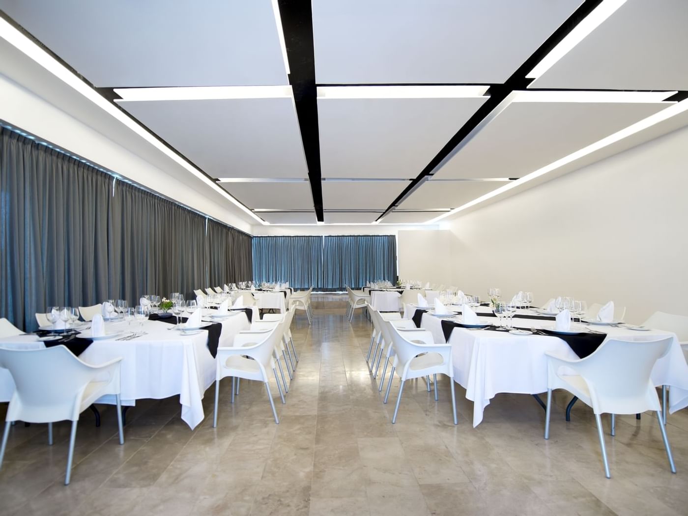 Dining area setup in meeting room at FA Condesa Cancún