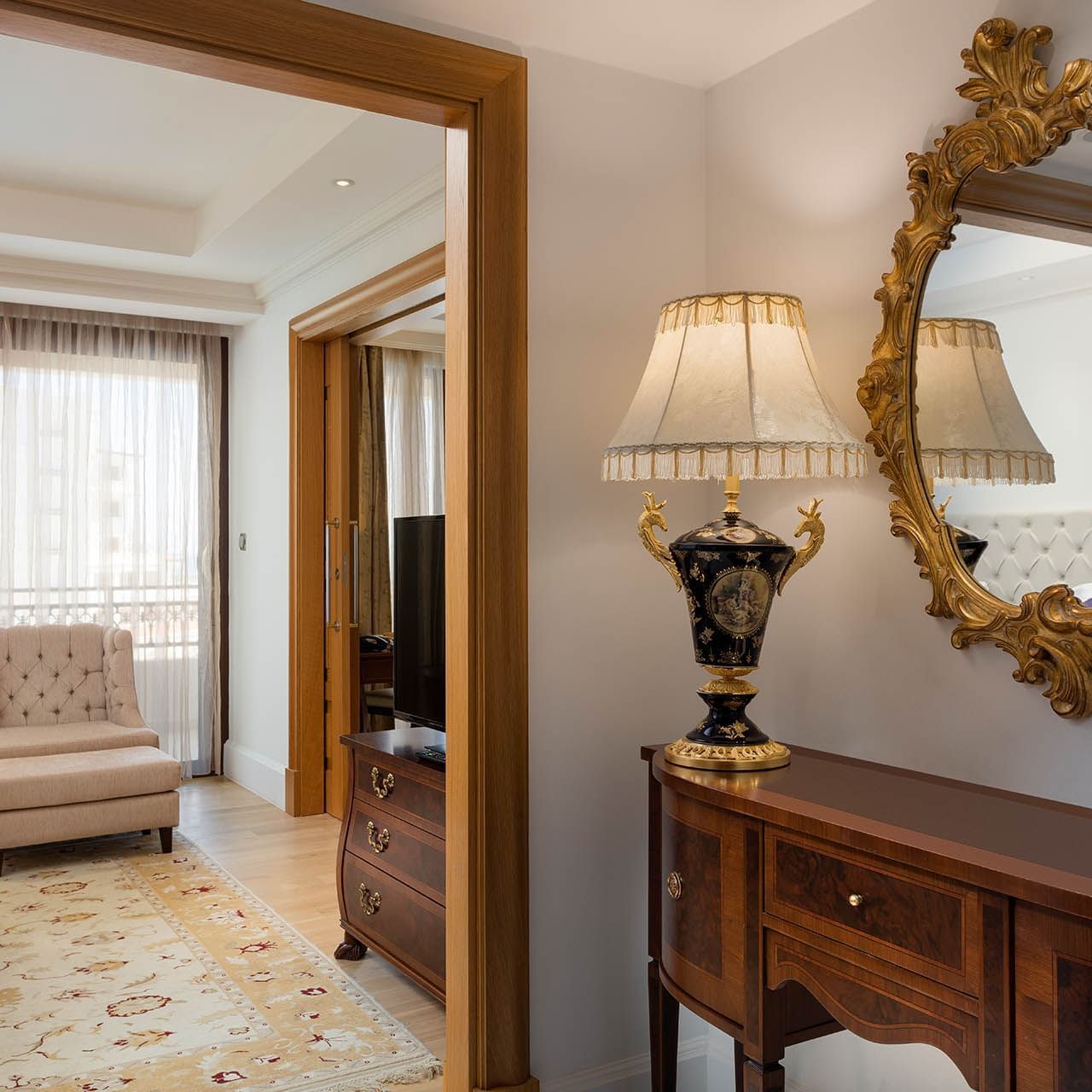 Mirror and lounge in Family Room at Titanic Mardan Palace