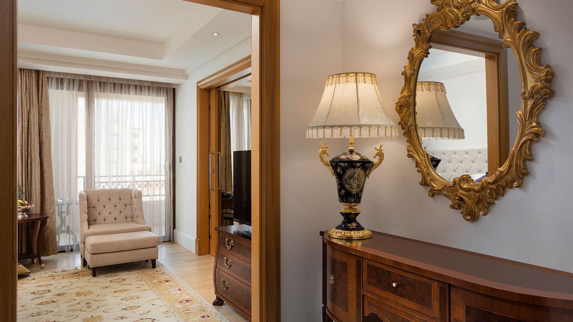 Mirror and lounge in Family Room at Titanic Mardan Palace