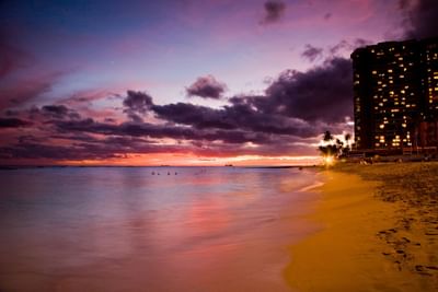 Landscape view of the beach at sunset near Stay Hotel Waikiki