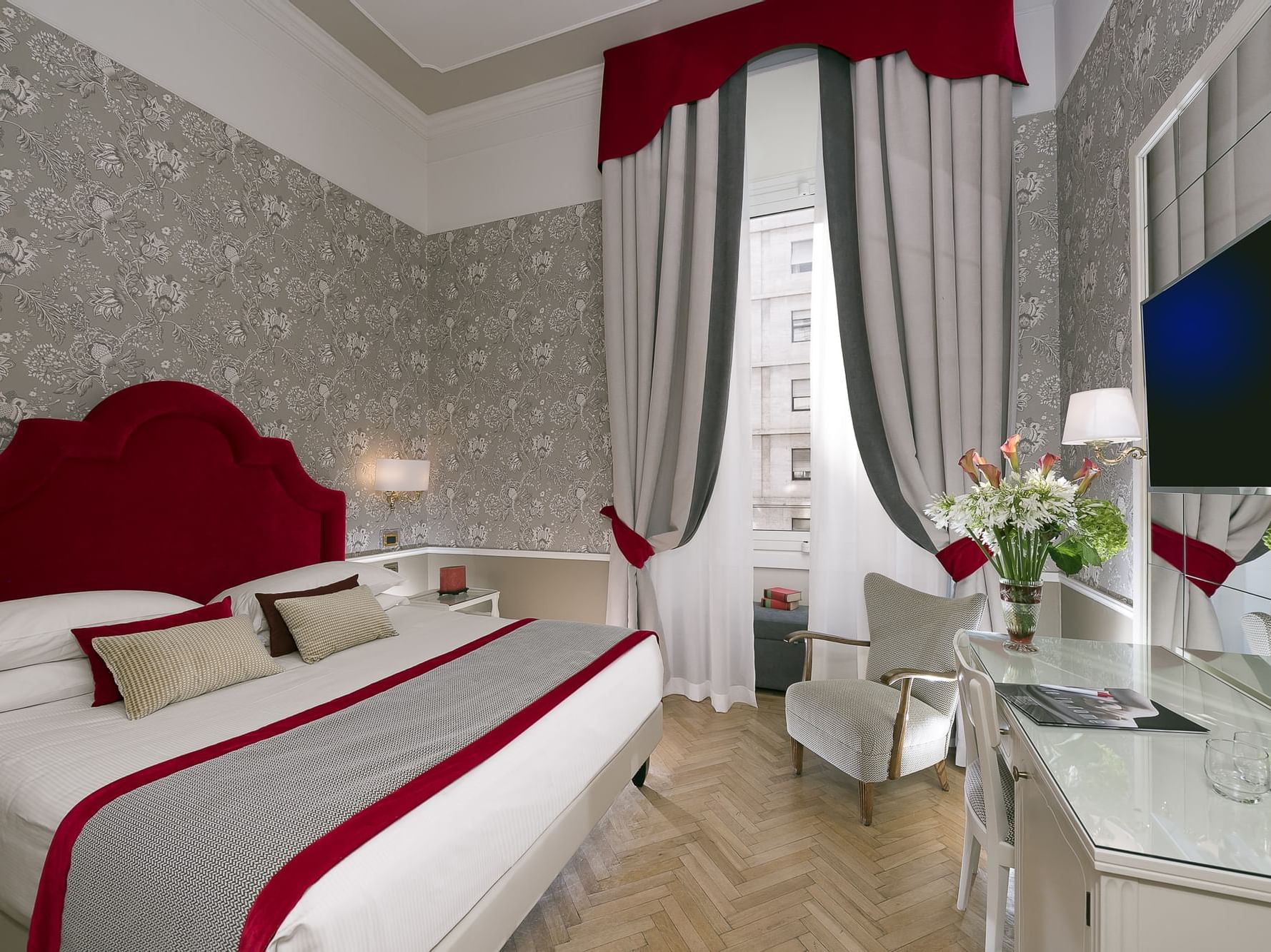 King bed, lounge & TV in Premium Room at Bettoja Hotel Massimo D'Azeglio