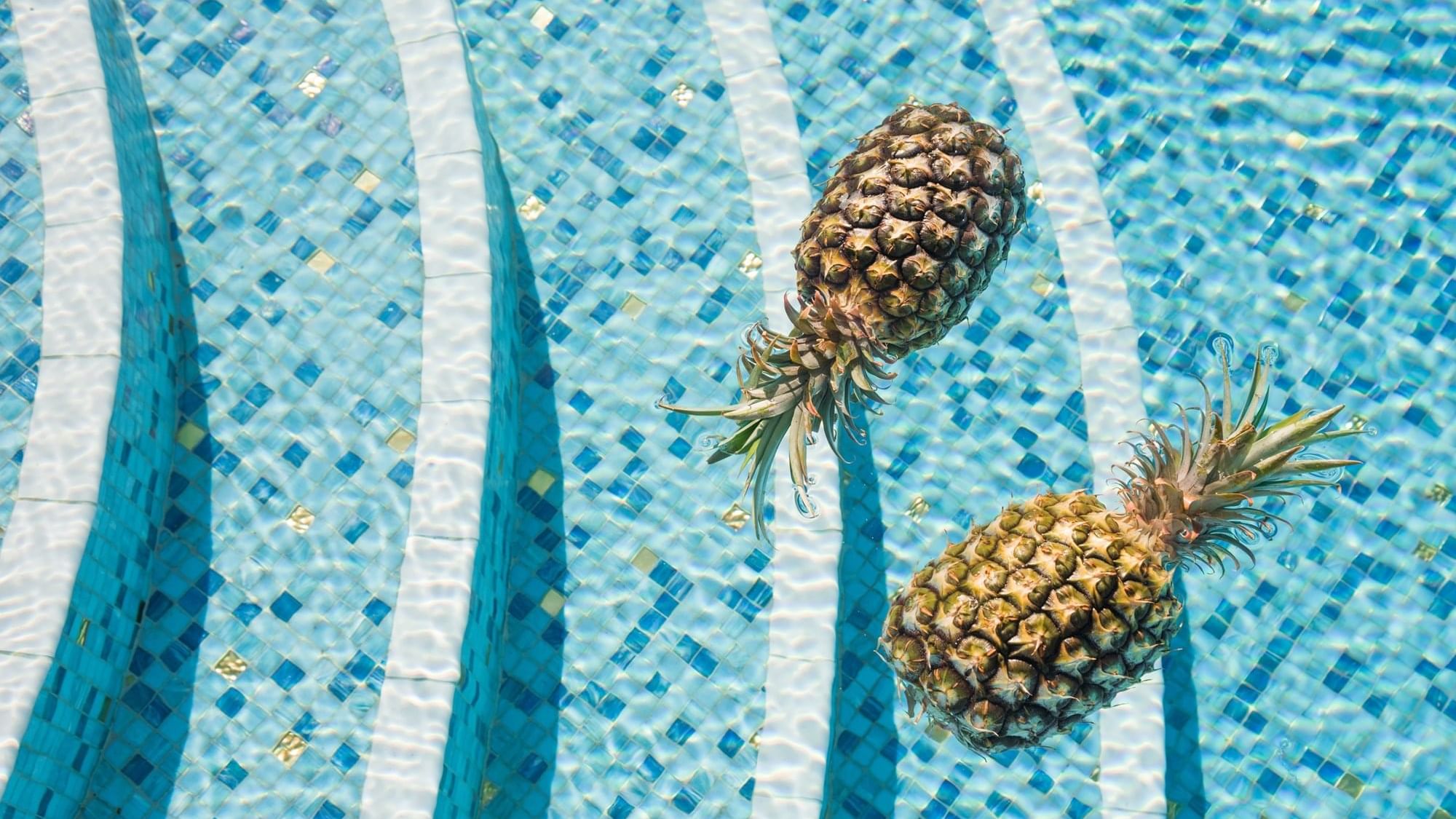Floating pineapples on the pool at Crown Hotel Perth