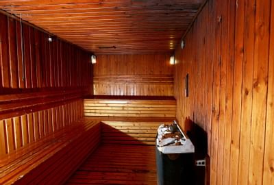 A wooden sauna room facility at Hanoi Daewoo Hotel