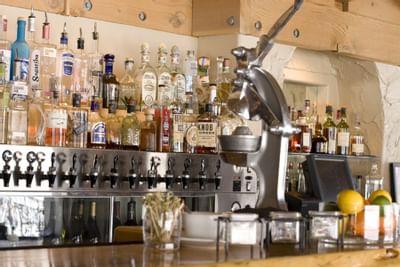 Bar taps, orange squeezer in Petra's Bistro Bar, Alpenhof Lodge