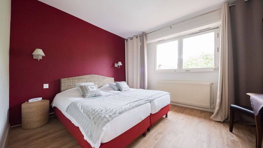 Double bed in Chambre Confort at Originals Le Kastelberg