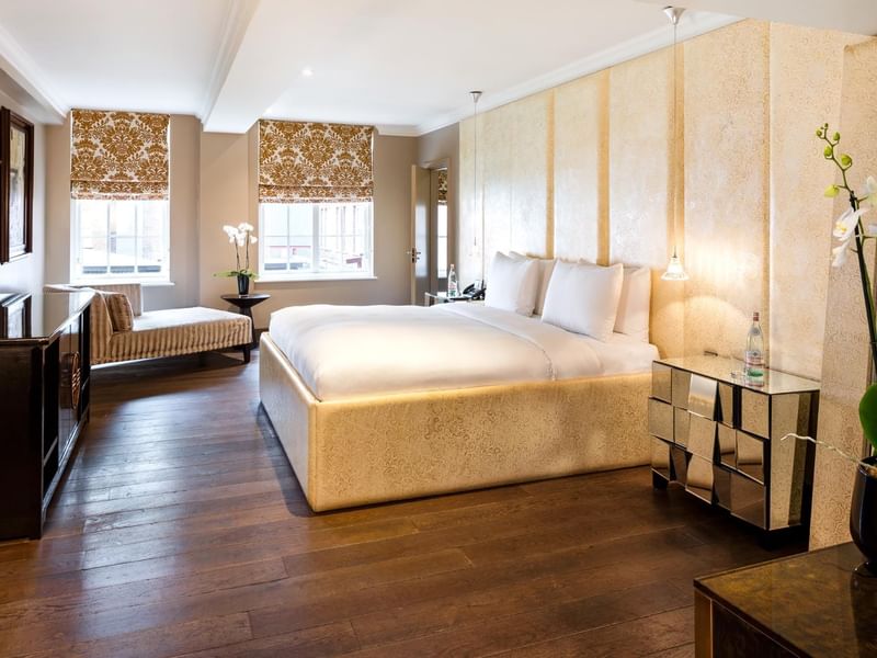 Interior of a room with king bed at The May Fair Hotel London