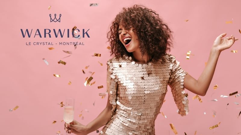 A lady enjoying a Bachelorette party with stylish clothes in a pink background at Warwick Le Crystal