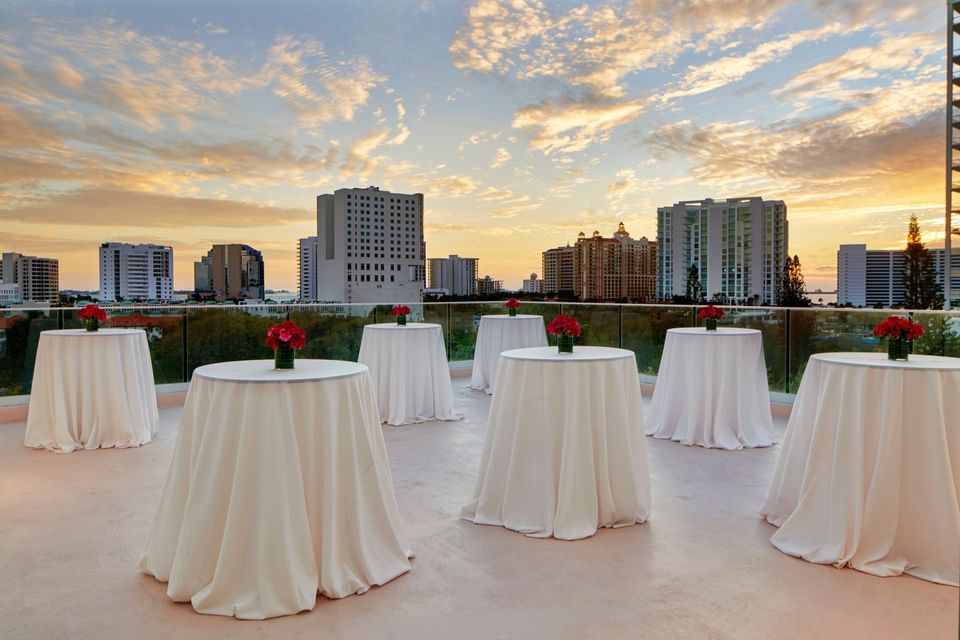 Flowers setup on tables in The Terrace at The Sarasota Modern