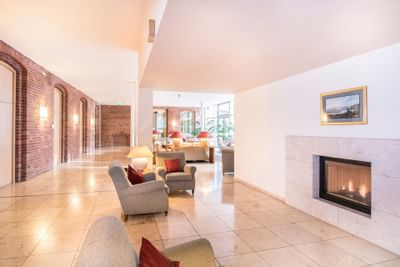 Sofas in front of Fireplace in Hotel Collegium Leoninum, Bonn