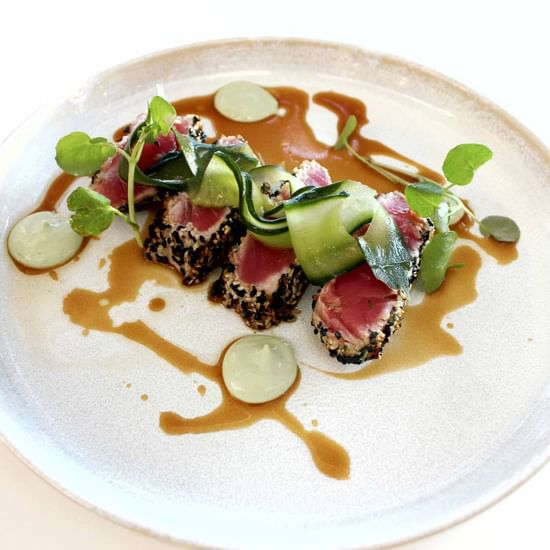 Sesame crusted tuna with cucumber served at Pullman Magenta Shores