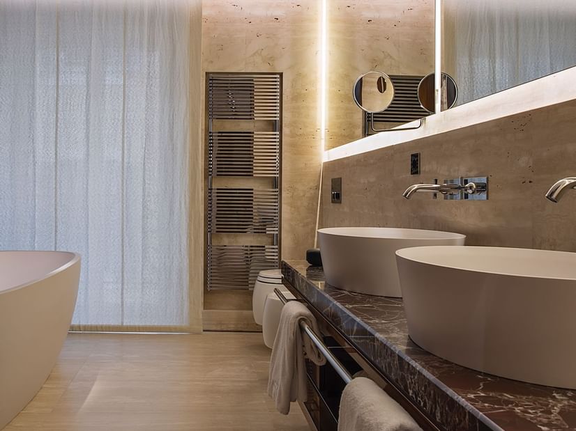 Bathroom with vanity in Suite 5 at Fendi Private Suites
