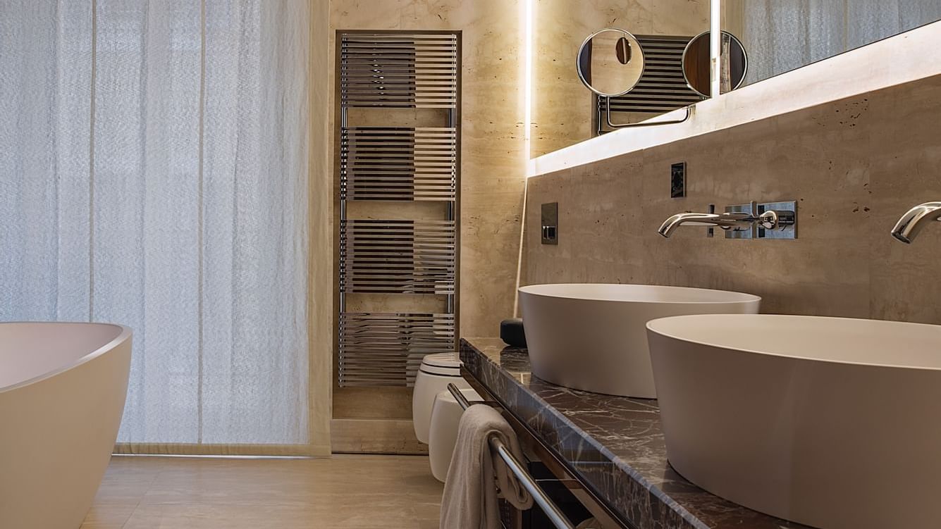 Bathroom with vanity in Suite 5 at Fendi Private Suites