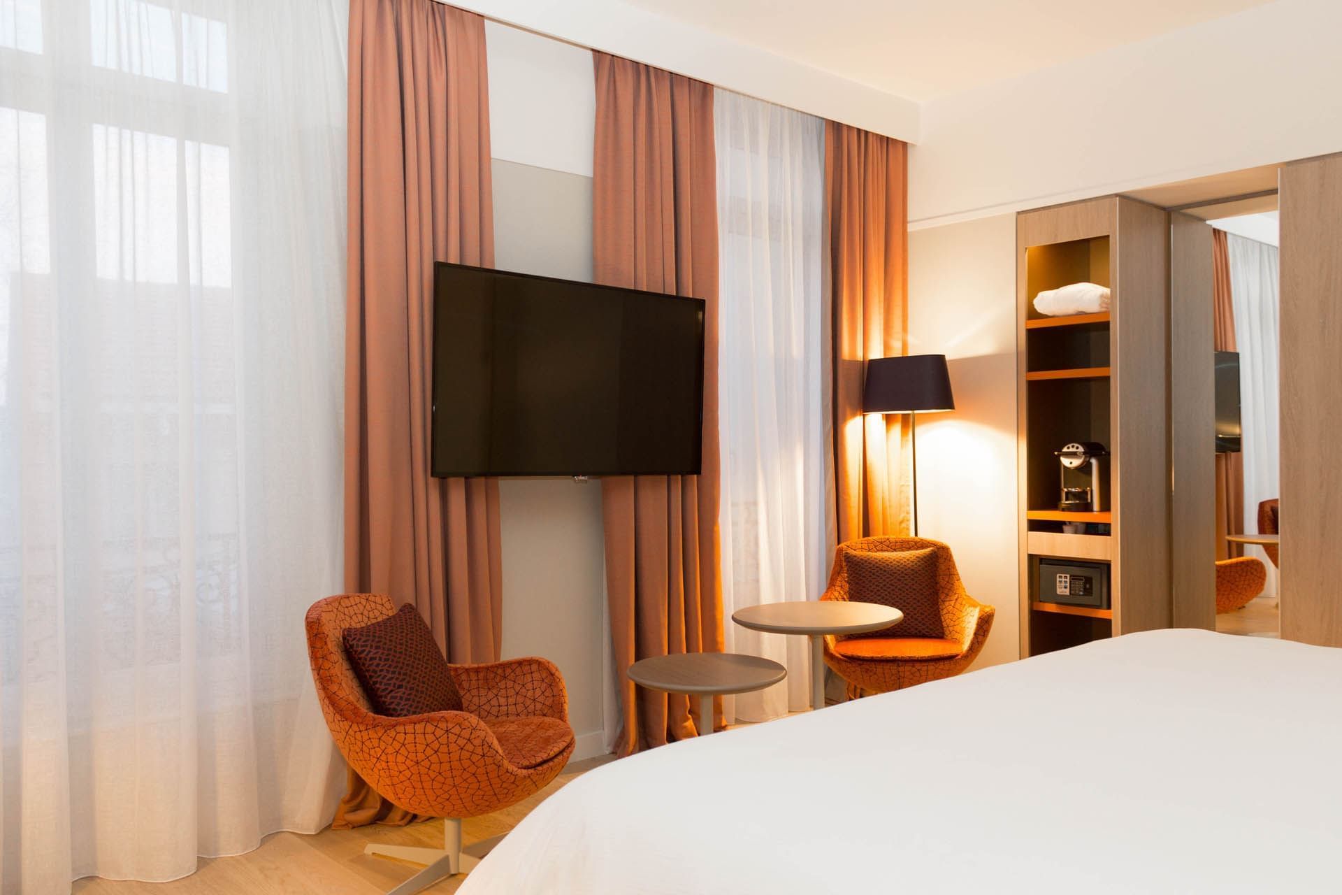 Intérieur de la chambre Deluxe à l'Oceania Le Métropole Montpellier