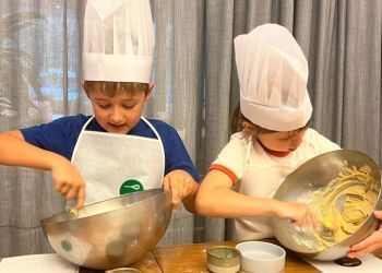 Kids making easter desserts at Amora Hotel Jamison Sydney