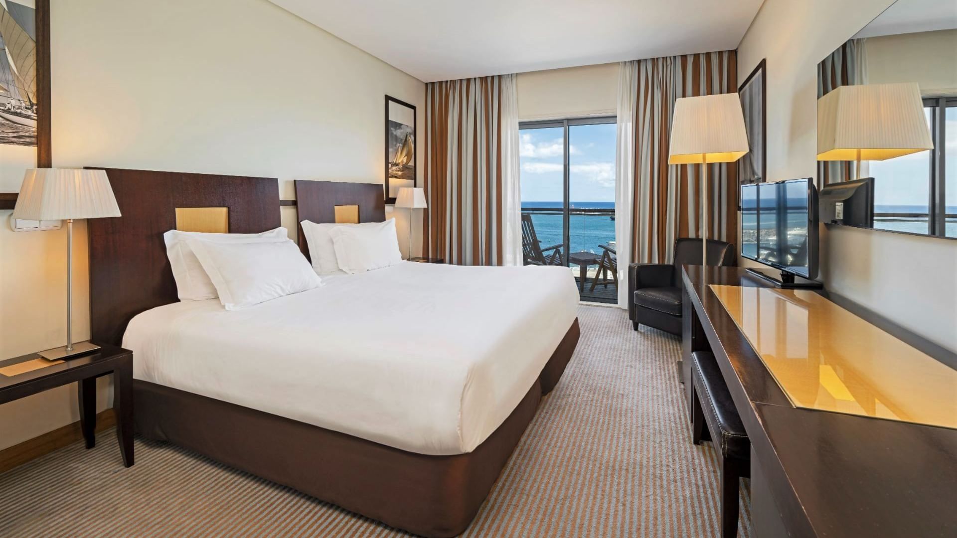 Twin beds in Standard Ocean View Room at Bensaude Hotels