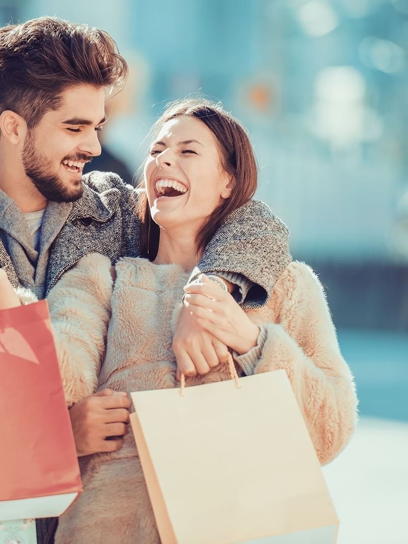 Couple shopping at Part Dieu mall near Warwick Reine Astrid - Lyon