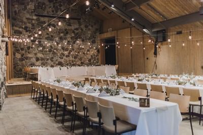 Dining tables are arranged in Chapel Theater at Sleeping Lady