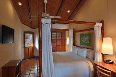 Bed & furniture in Junior Suite-Whirpool at Punta Islita Hotel
