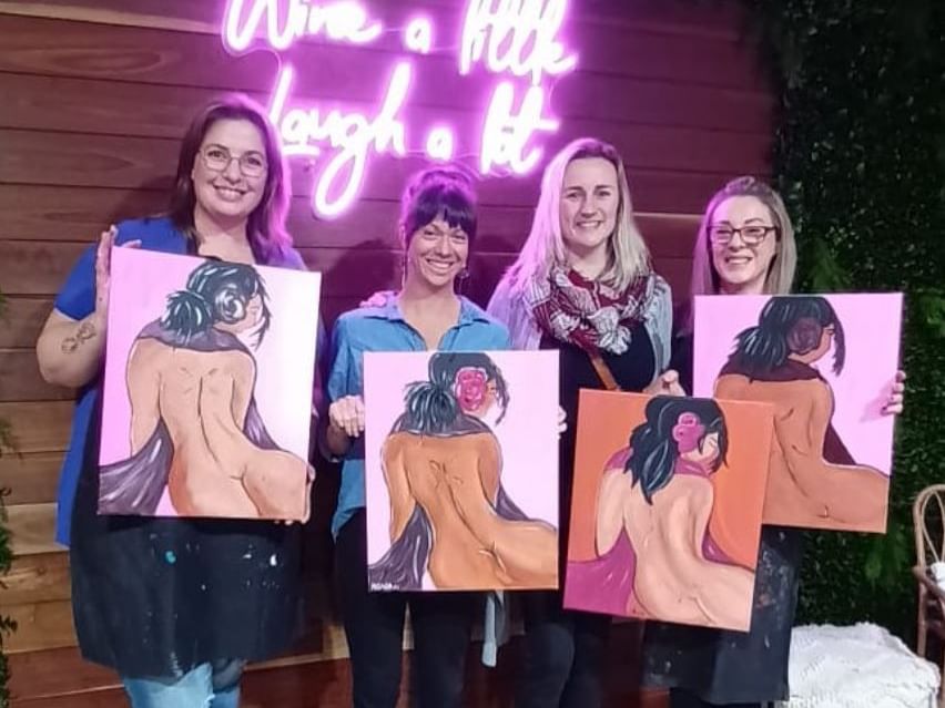 Ladies holding paintings, Brush by the Vines near Nesuto Docklands