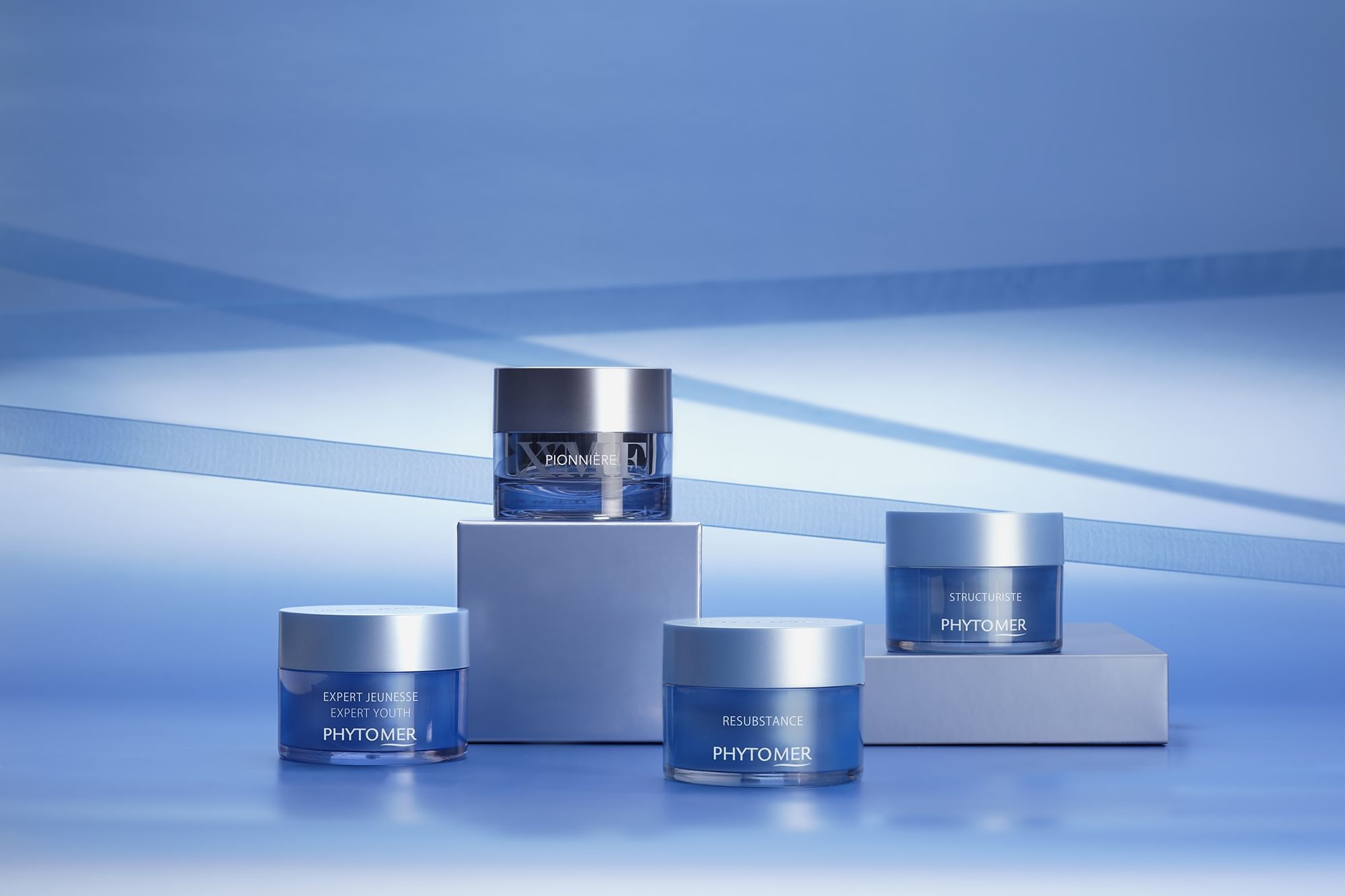 Anti-ageing Creams on a light blue background at The Spa by Warwick Melrose