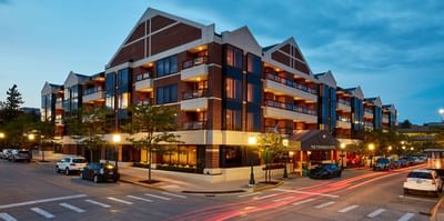 Exterior view of The Townsend Hotel in the evening