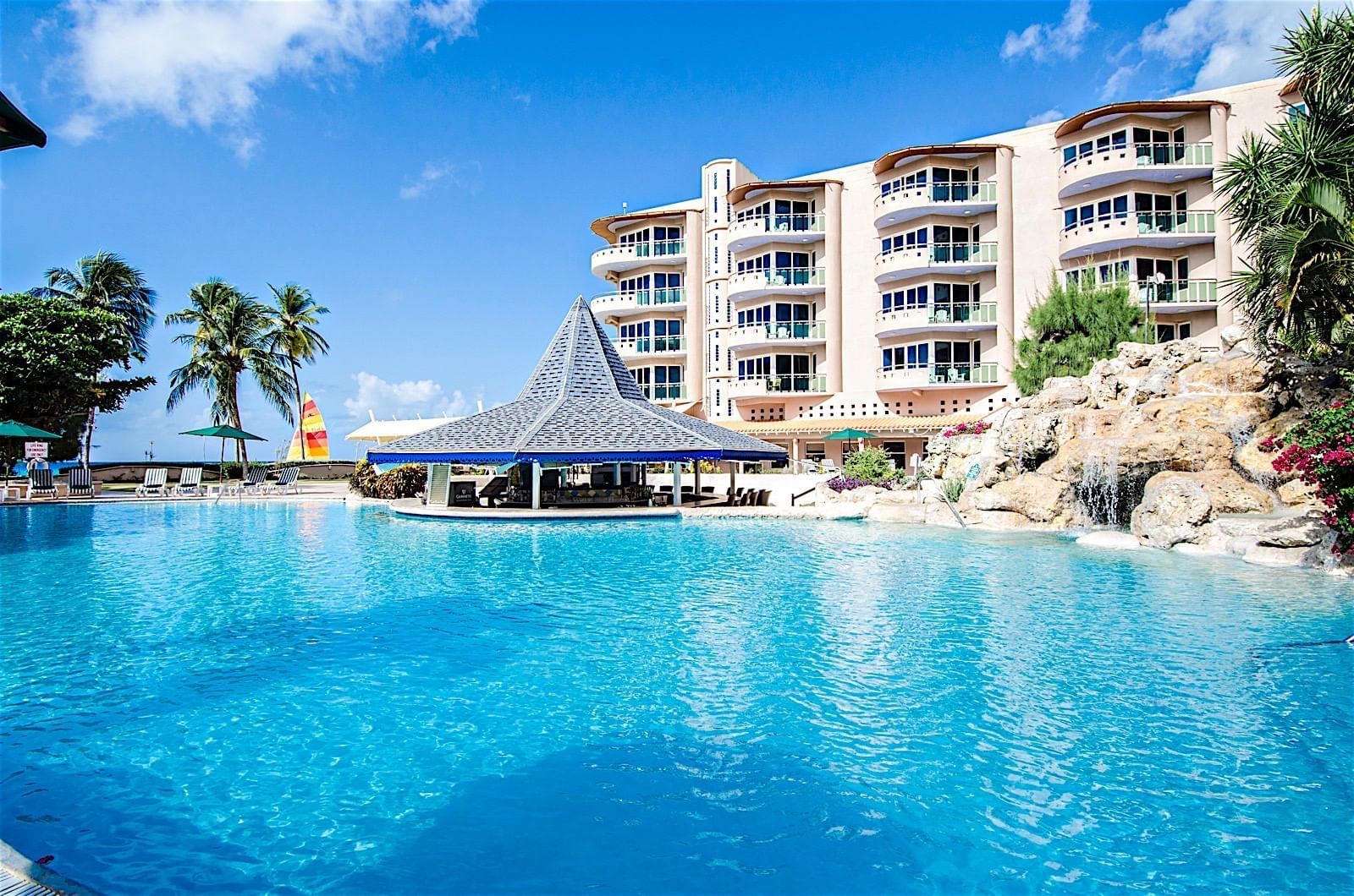 Close up on the outdoor pool wit sea views at Accra Hotels