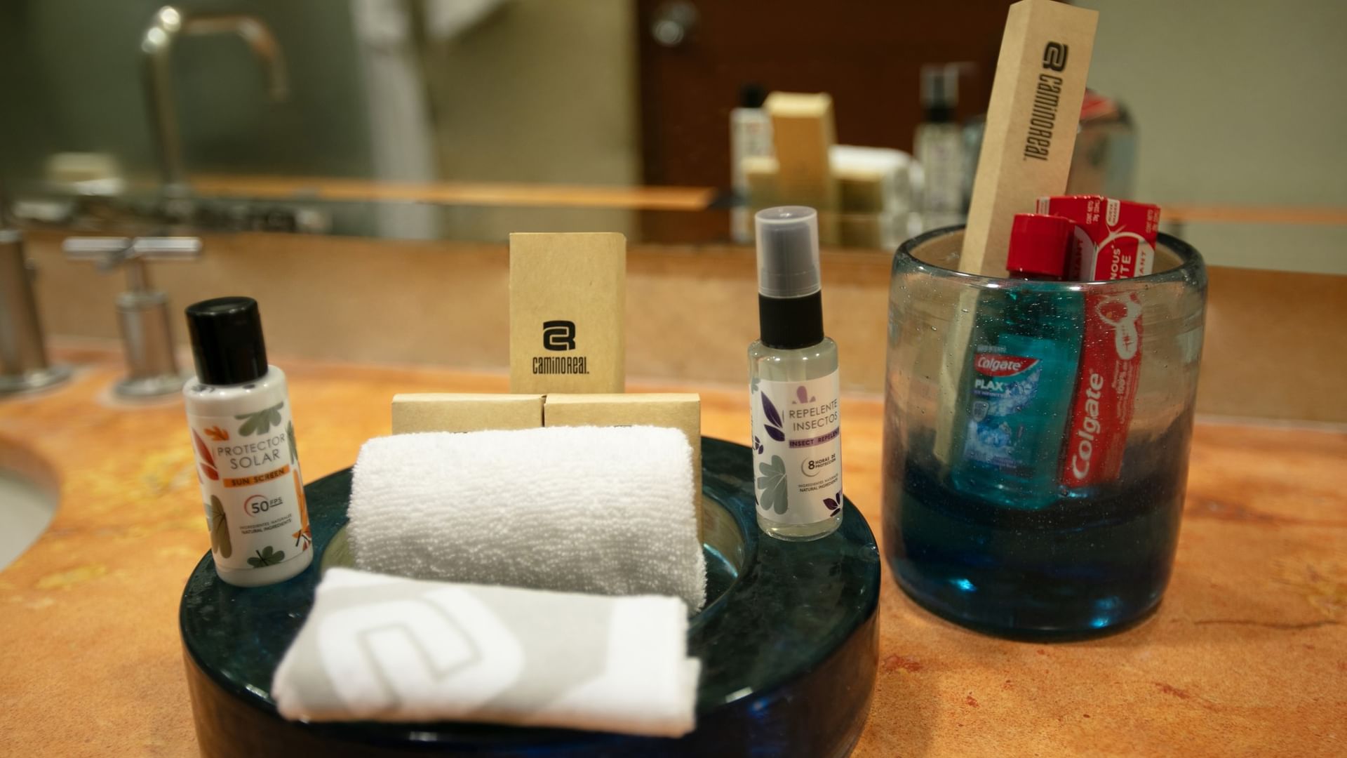 Amenities and toiletries arranged on bathroom counter at Camino Real Guadalajara in Zapopan