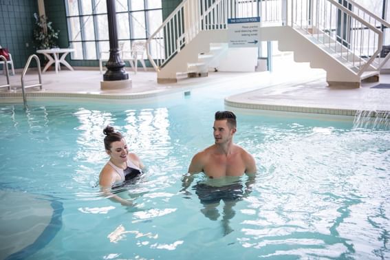 Couple enjoying in the indoor pool at Temple Gardens Hotel & Spa