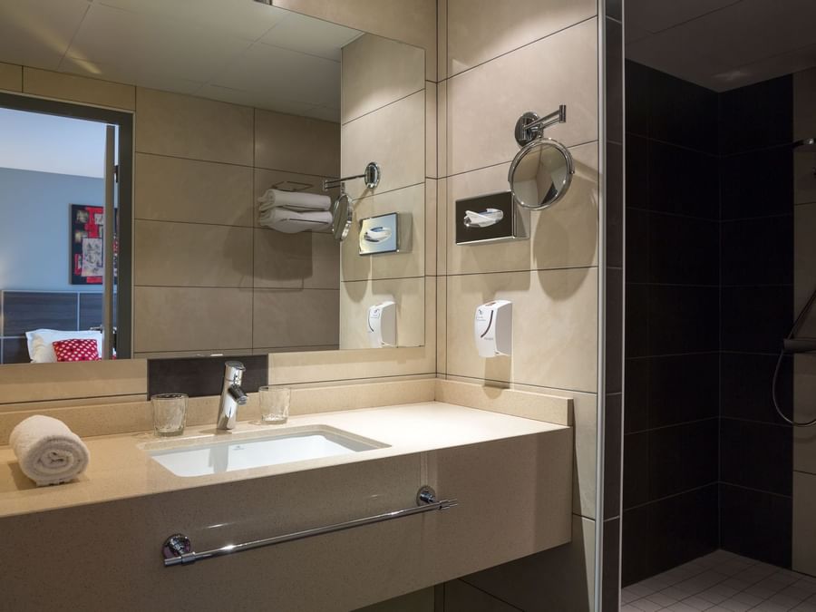 Bathroom vanity in bedrooms at Actuel Hotel