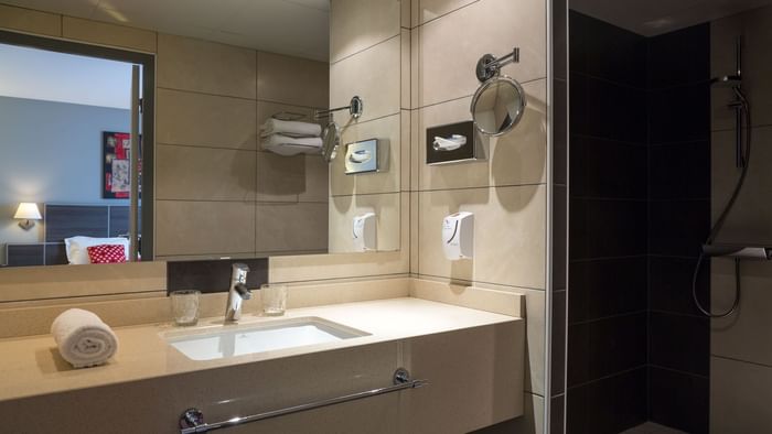 Bathroom vanity in bedrooms at Actuel Hotel