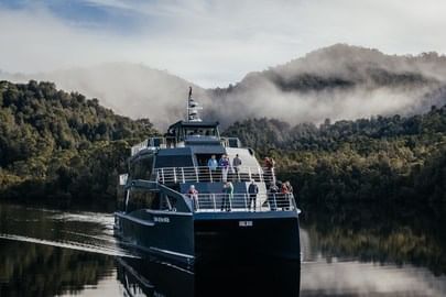 People experiencing a cruise on the Lake near Freycinet Lodge