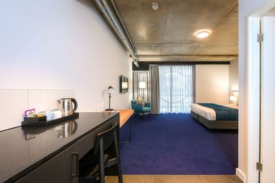 Coffee tray on a Bedroom desk at Nesuto Curtin Perth Hotel