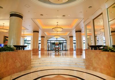 Main entrance with a chandelier at Hanoi Daewoo Hotel