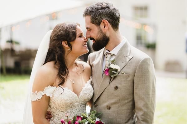 Bride and groom at Gorse Hill, an affordable wedding venue in Surrey