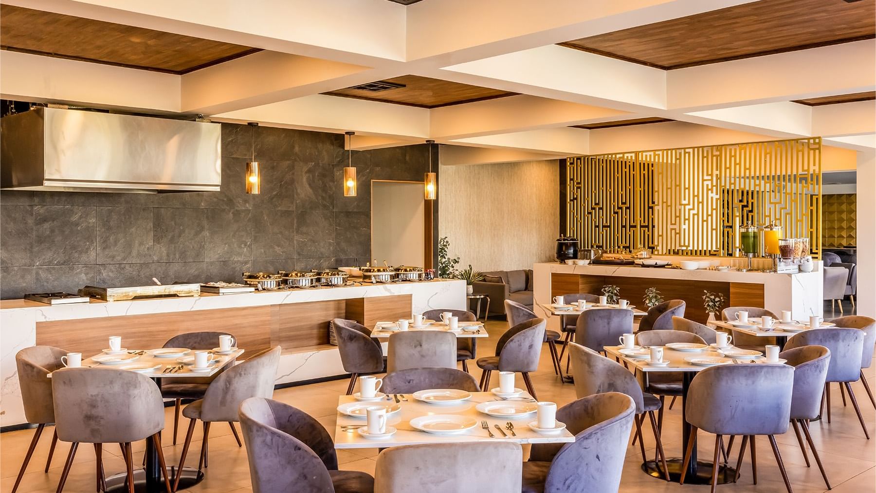 Dining area by the restaurant buffet at Gamma Ciudad Juarez