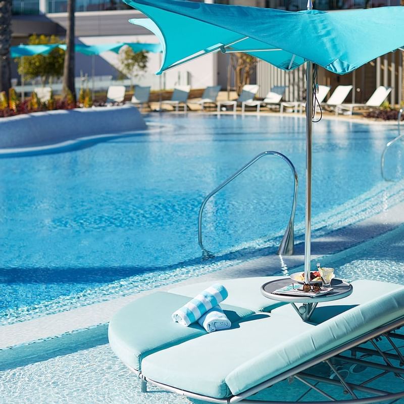 A sunbed by the outdoor pool at Crown Towers Perth