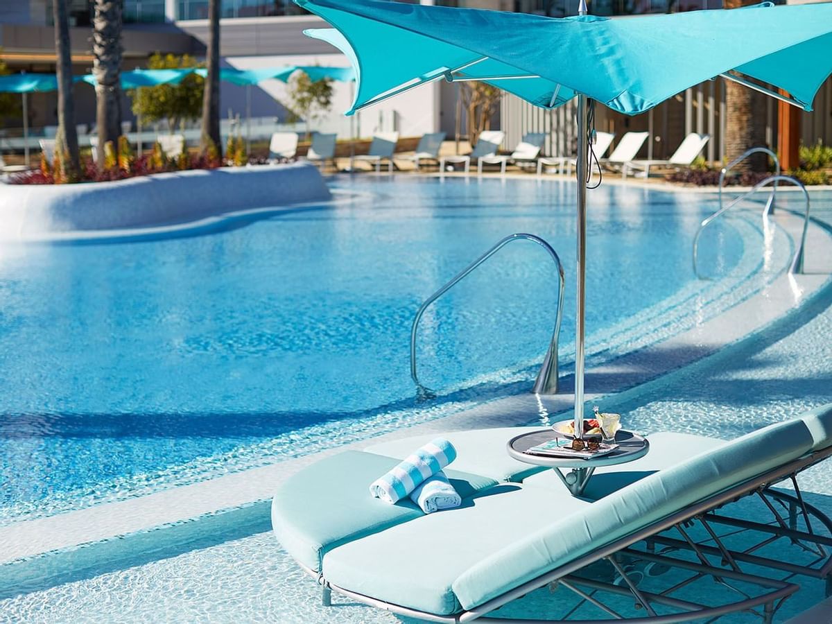 A sunbed by the outdoor pool at Crown Towers Perth