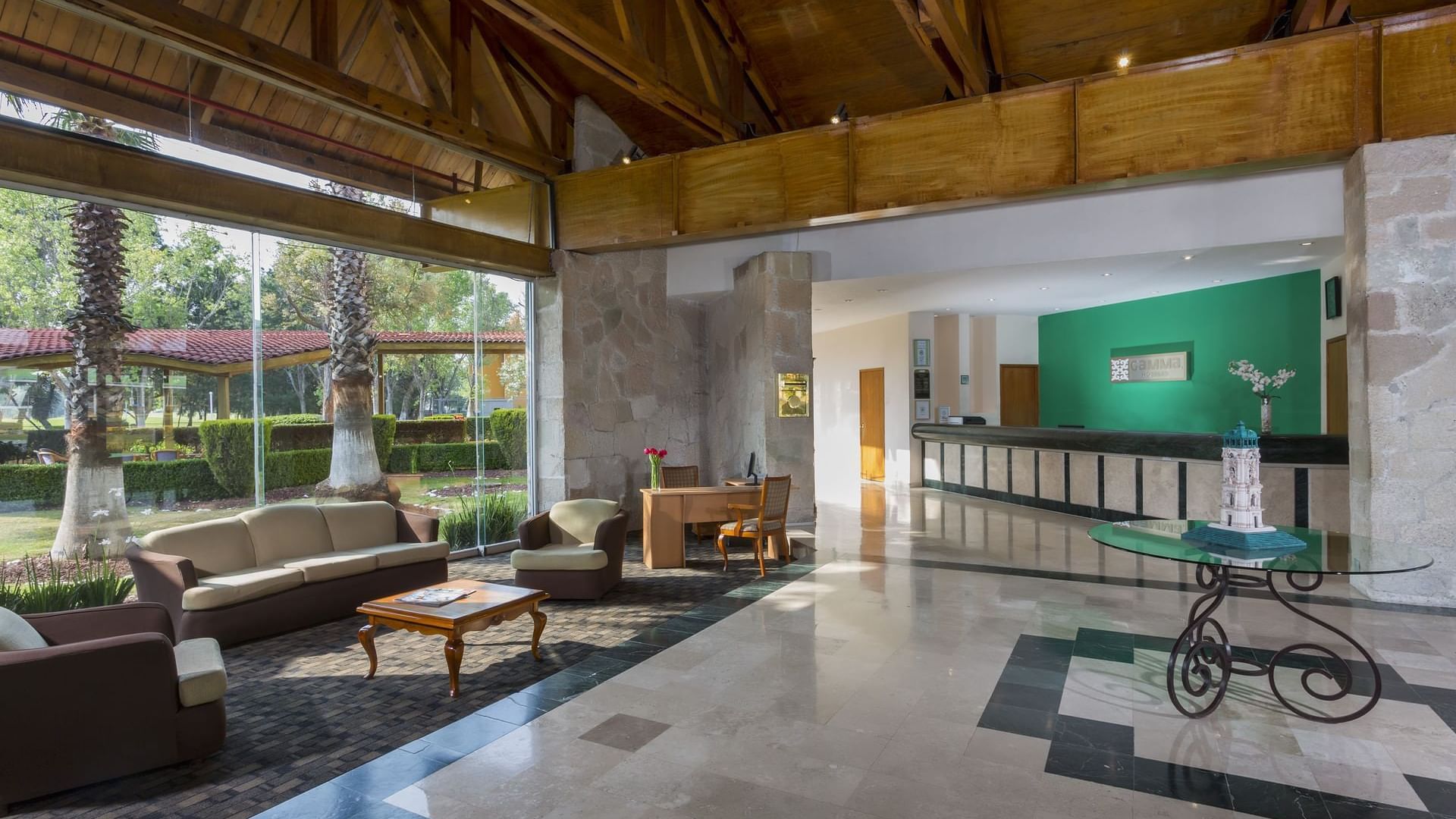 Interior of the lounge and reception area at Gamma Pachuca
