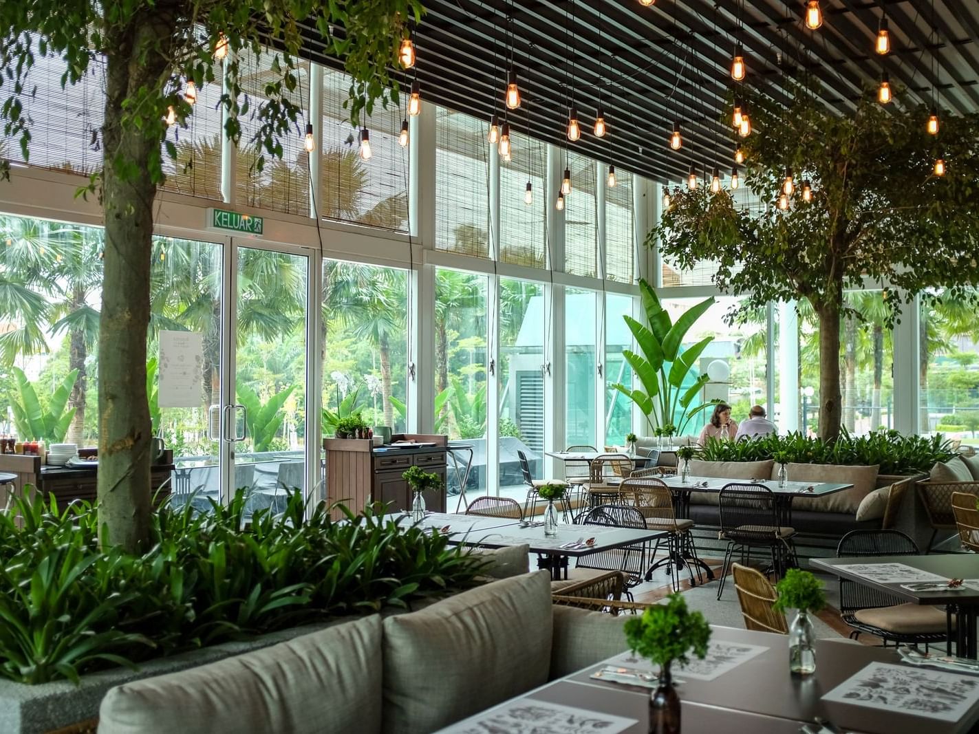 Dining area in Botanica + Co Restaurant near VE Hotel