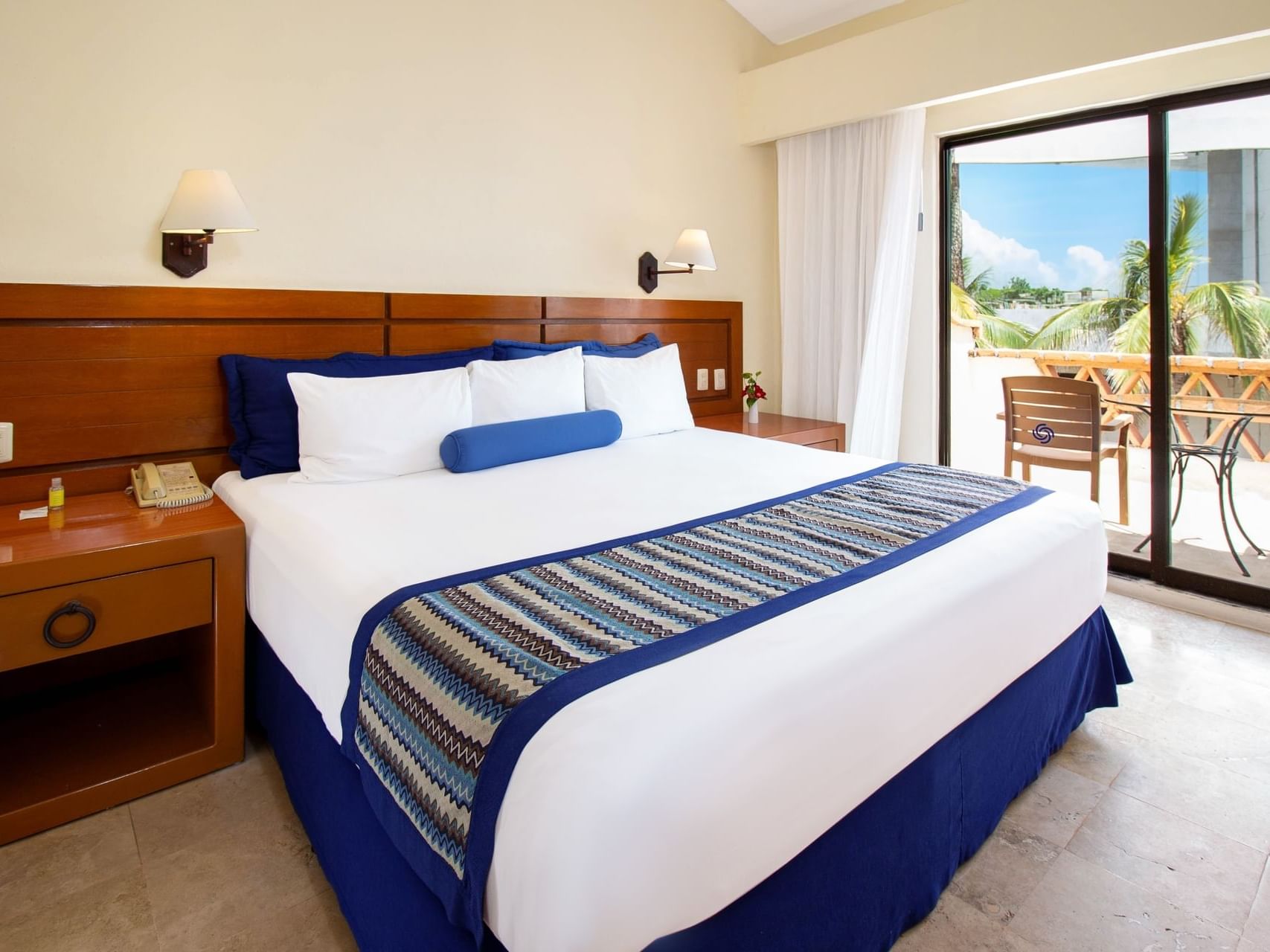 Nightstands by the bed in 1 Bedroom King Suite with Terrace at Plaza Pelicanos Grand Beach Resort