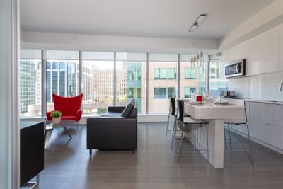 Kitchen & living area with a city view at ReStays Ottawa