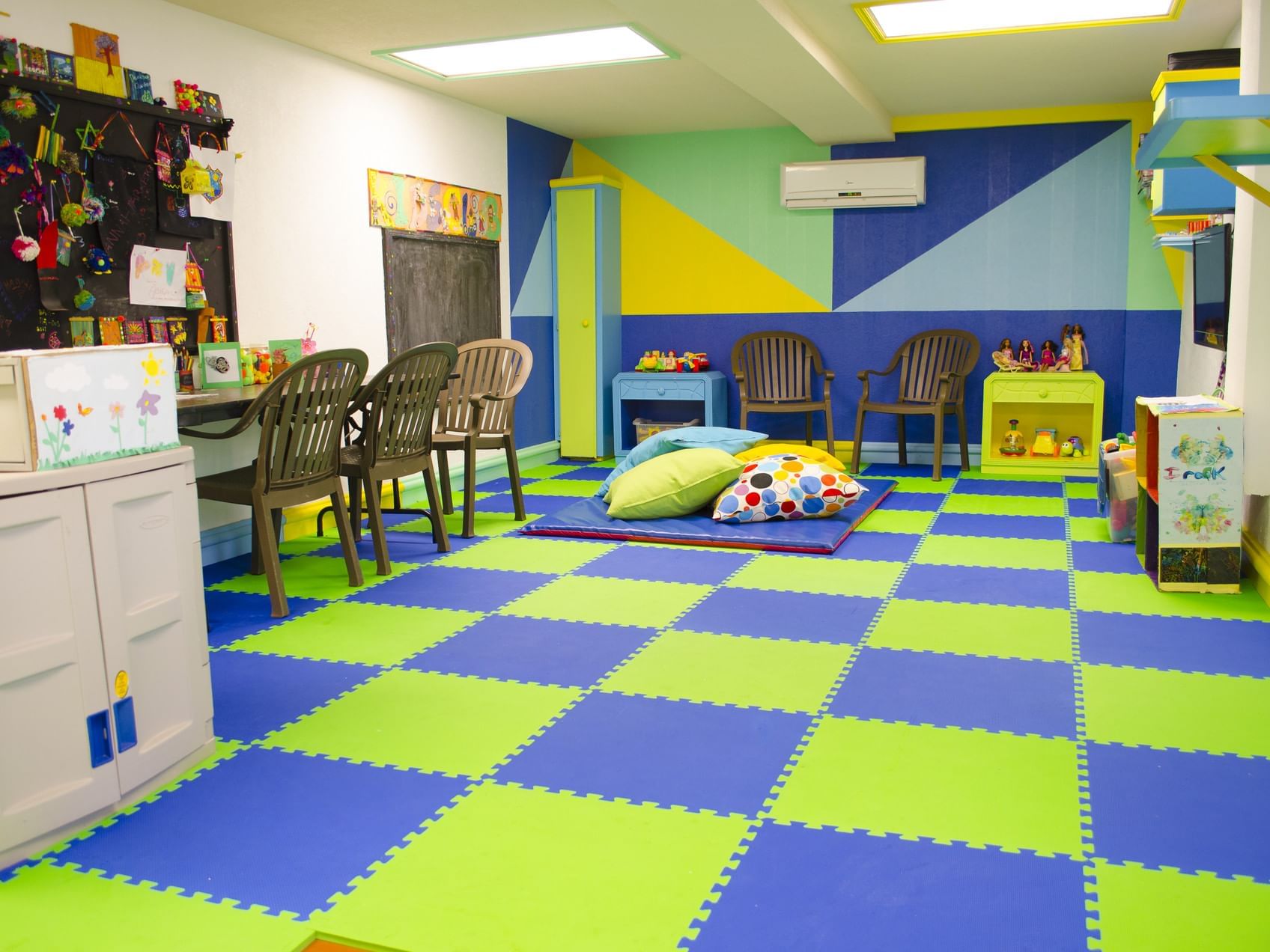 Colorful interior of the Kid's Club with toys and games at Accra Hotels & Resorts