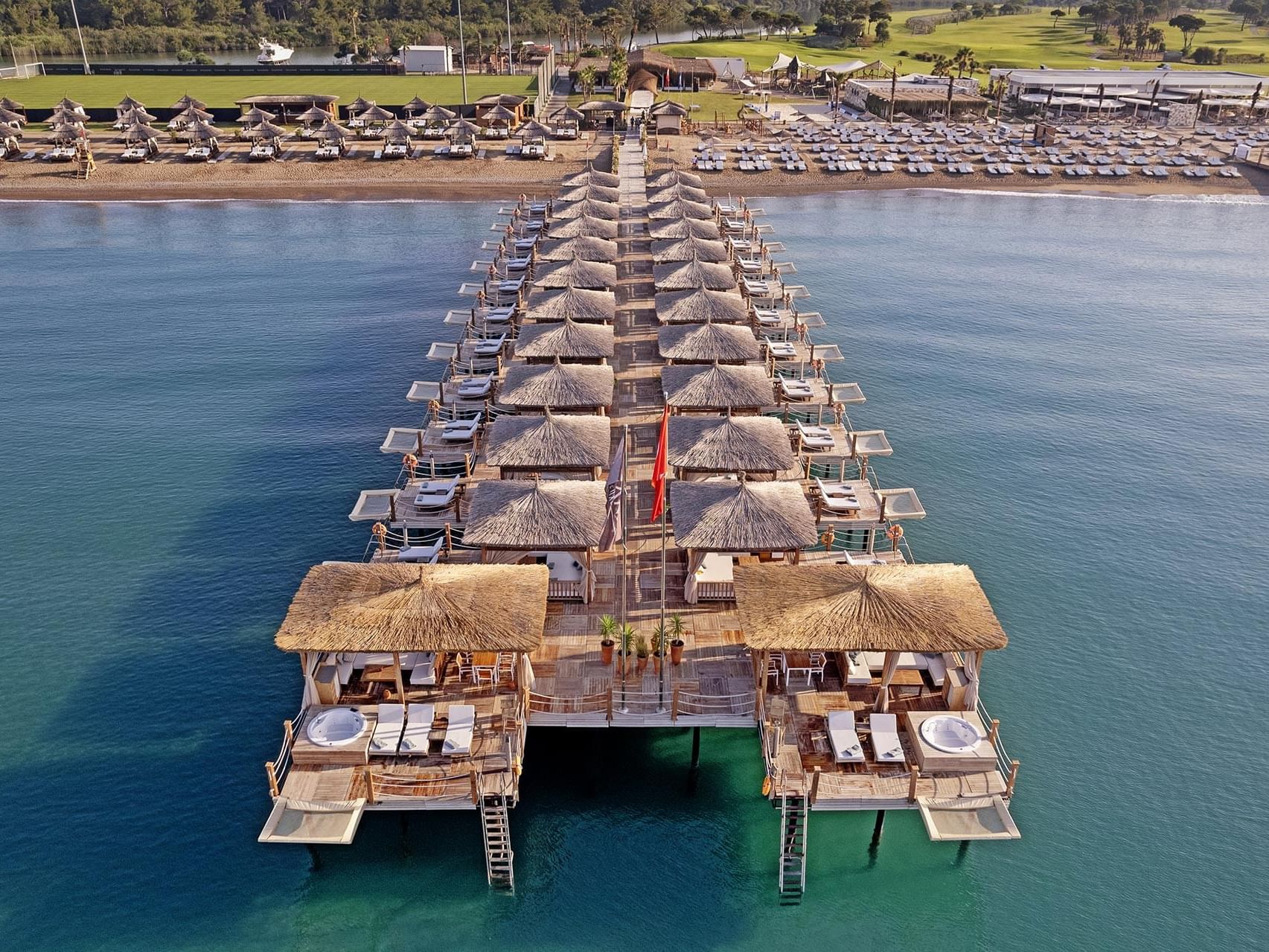 Aerial view of Beach huts facing the Beach Pier near Titanic Deluxe Golf Belek