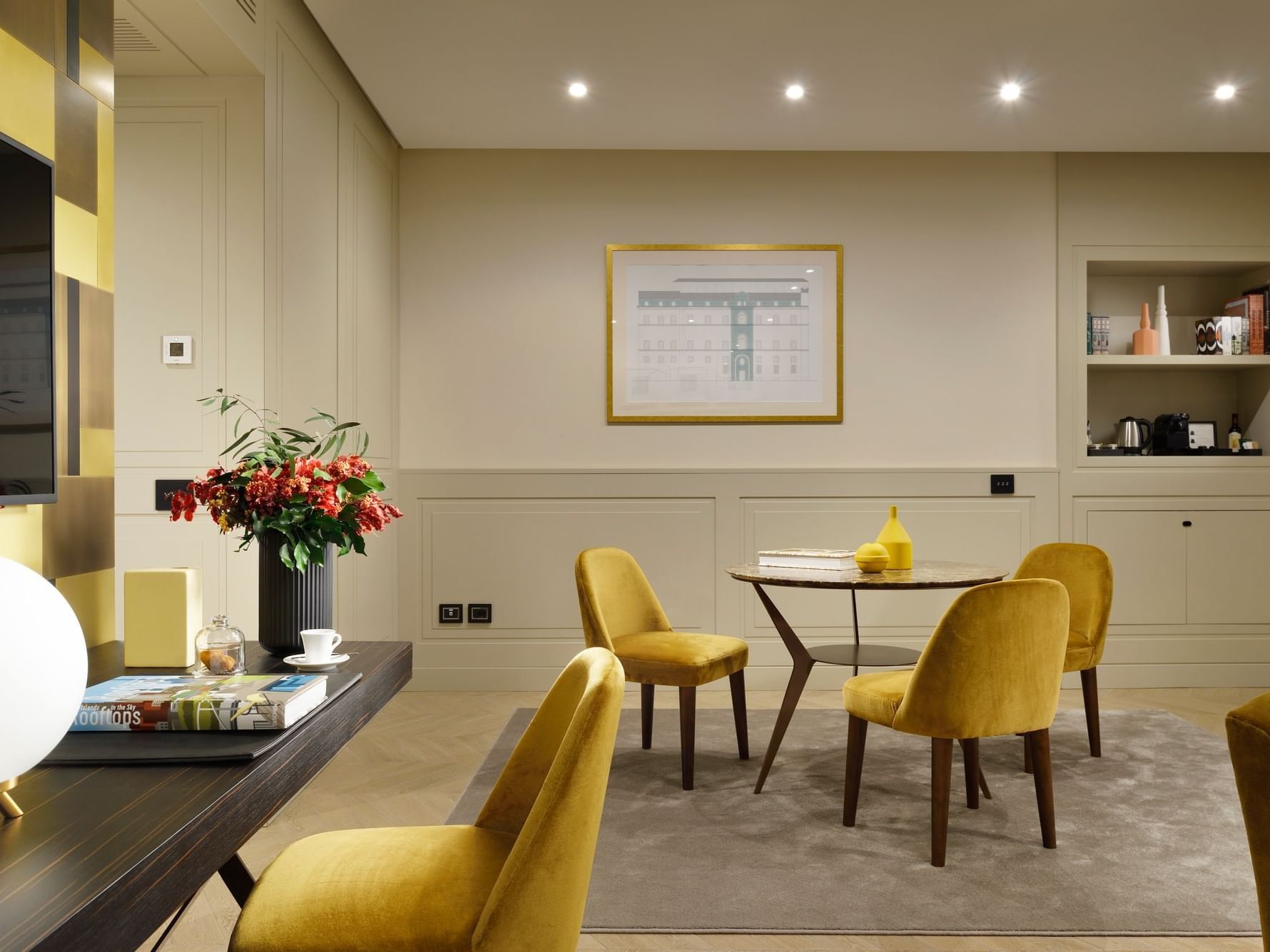 Dining table and work desk arranged in Studio Suite at Margutta 54