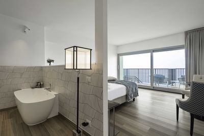 Vanity area with a lamp in Lazula Room at Sublimis Boutique Hotel Camogli