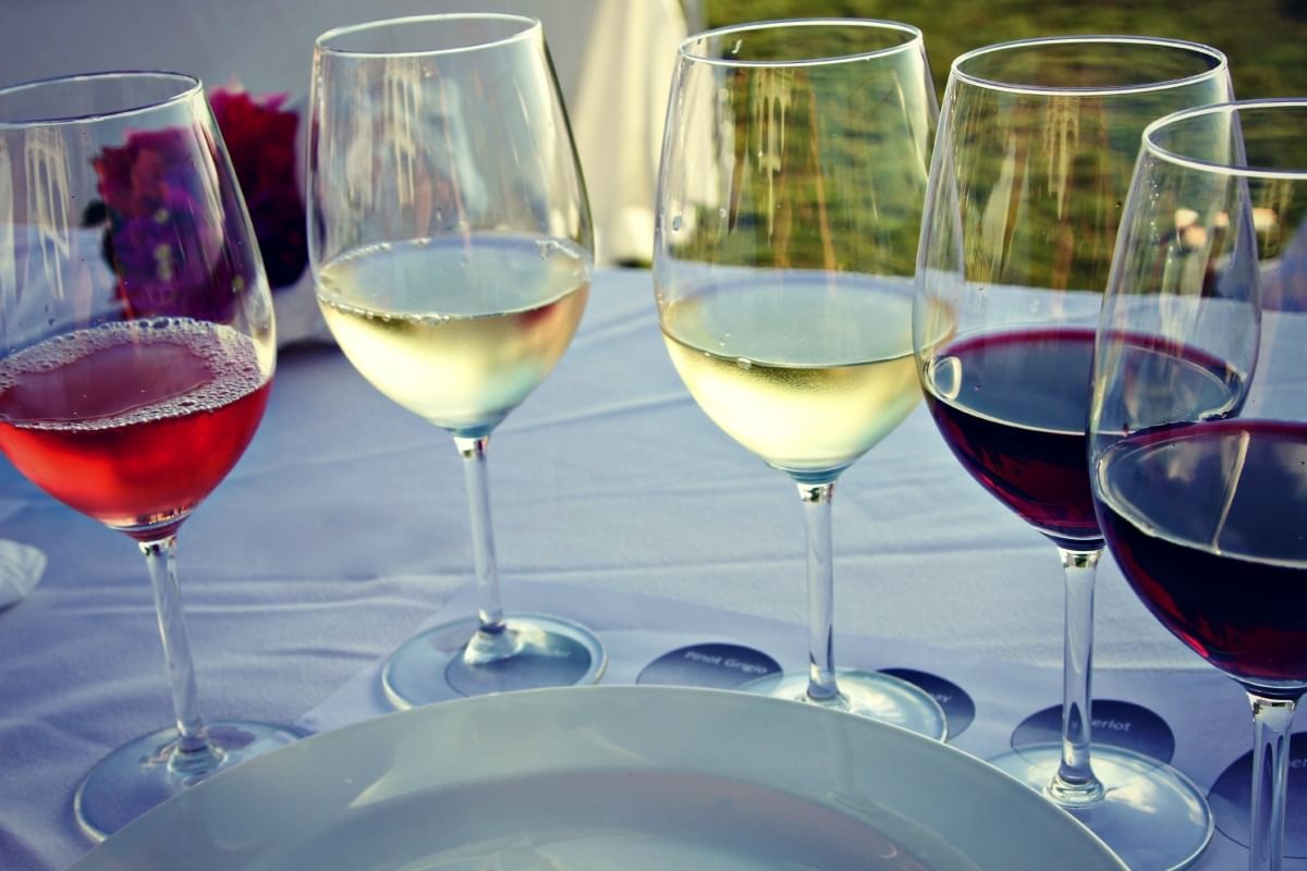 Wine glasses served on a table at The Somerset on Grace Bay